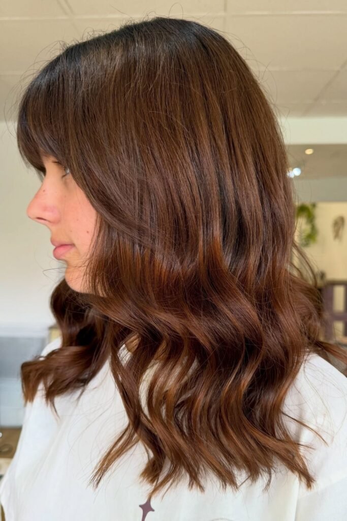 Warm Chestnut With a Soft Curtain Fringe