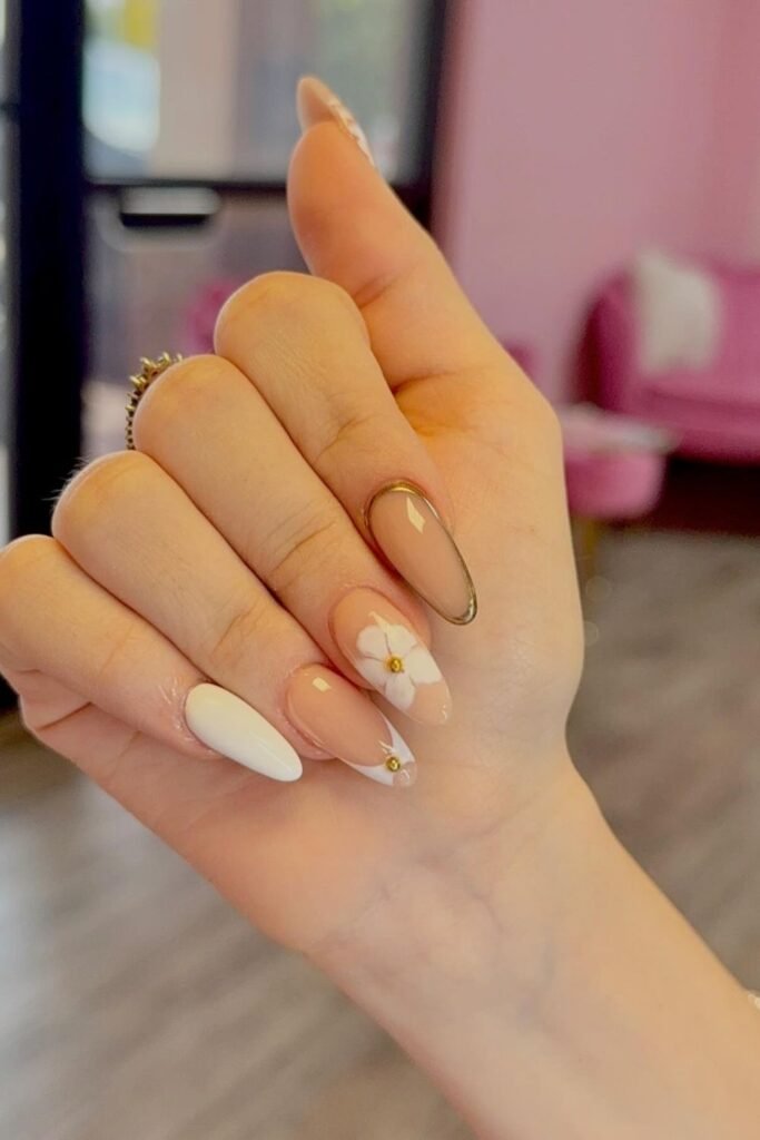 White and Nude Mix with a Gold Outline and a Single Flower