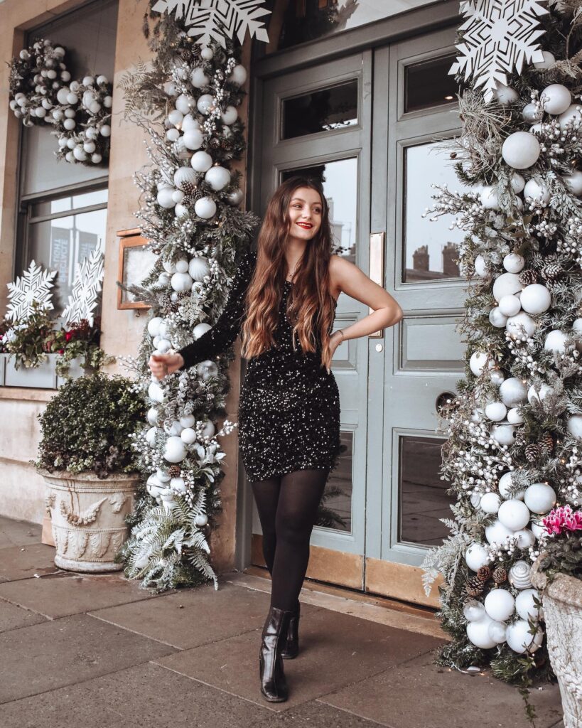 Black Sequin Mini With One Statement Sleeve