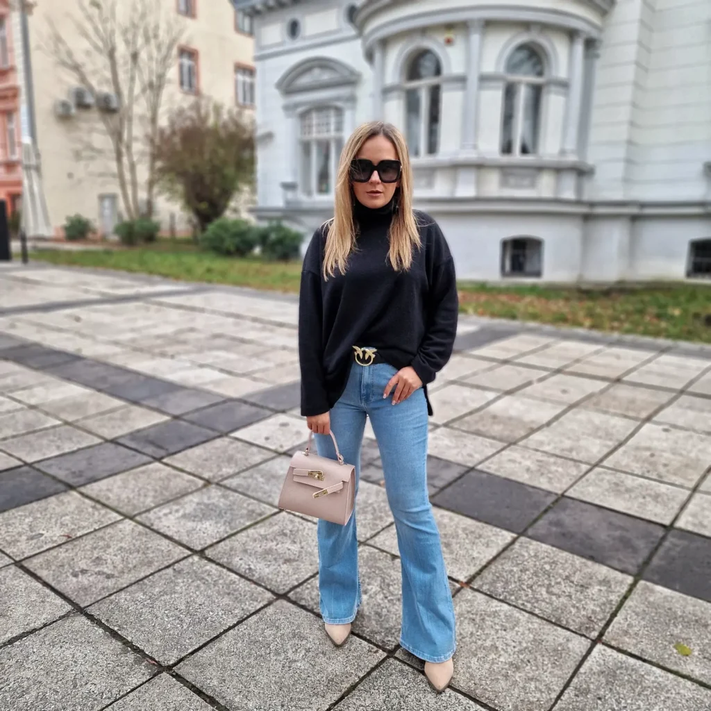 Black Turtleneck With Light Wash Flared Jeans