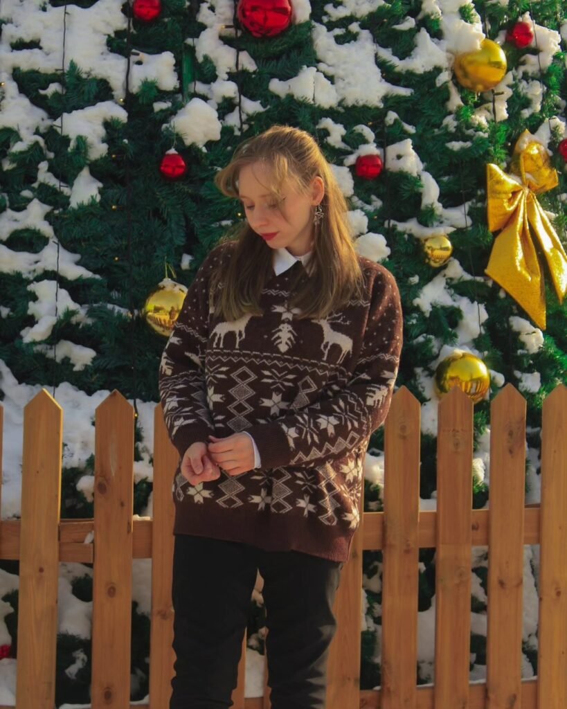 Brown Reindeer Sweater Over a Crisp White Shirt