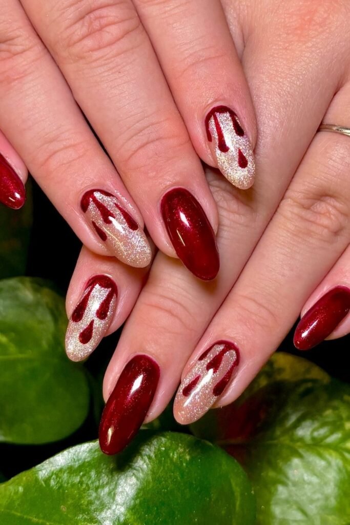 Burgundy Shimmer Nails With Champagne Blood Drips