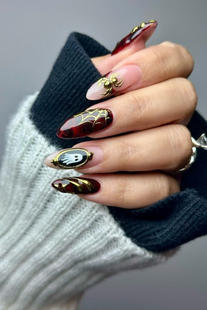 Burgundy and Gold Halloween Nails With a Ghost Cameo