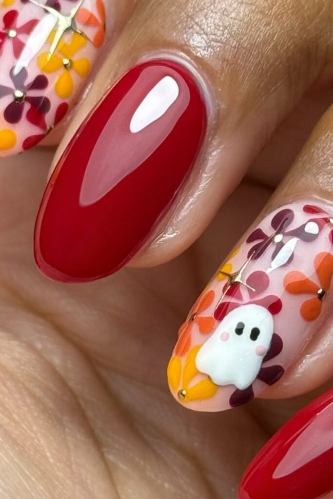 Cherry Red Nails With a Tiny Ghost and Floral Accent