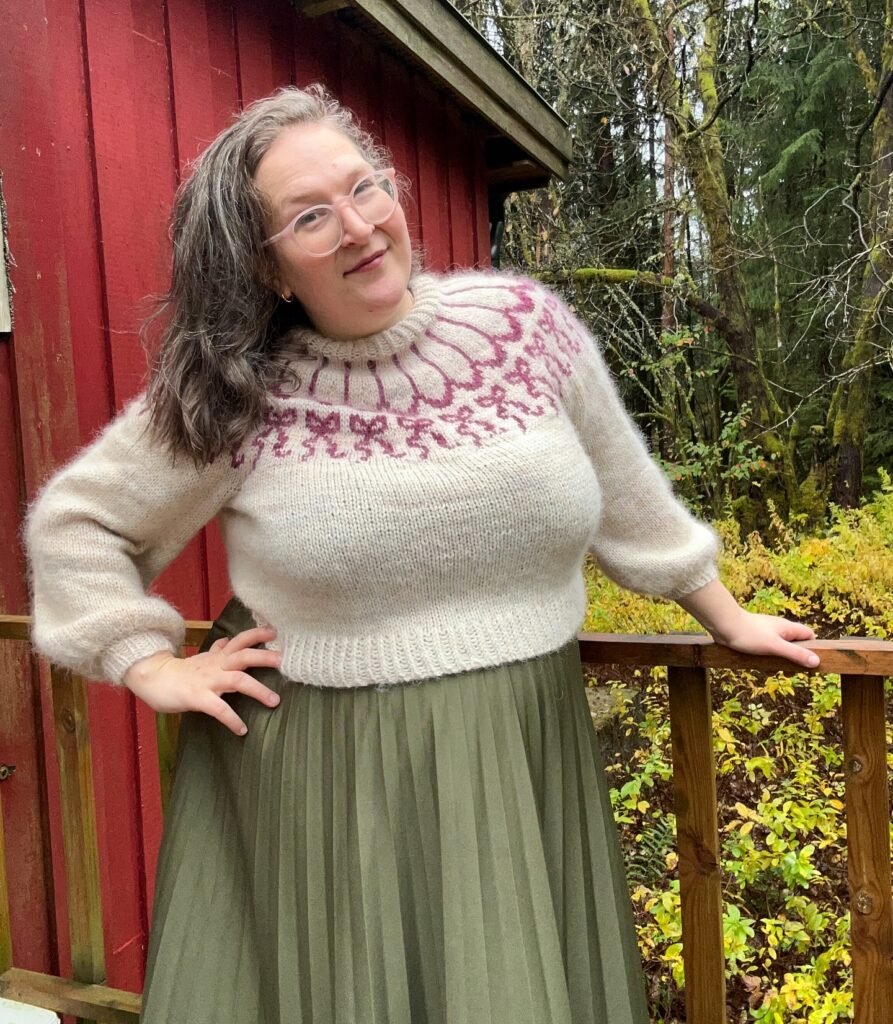 Cream Fair Isle Sweater With an Olive Pleated Skirt