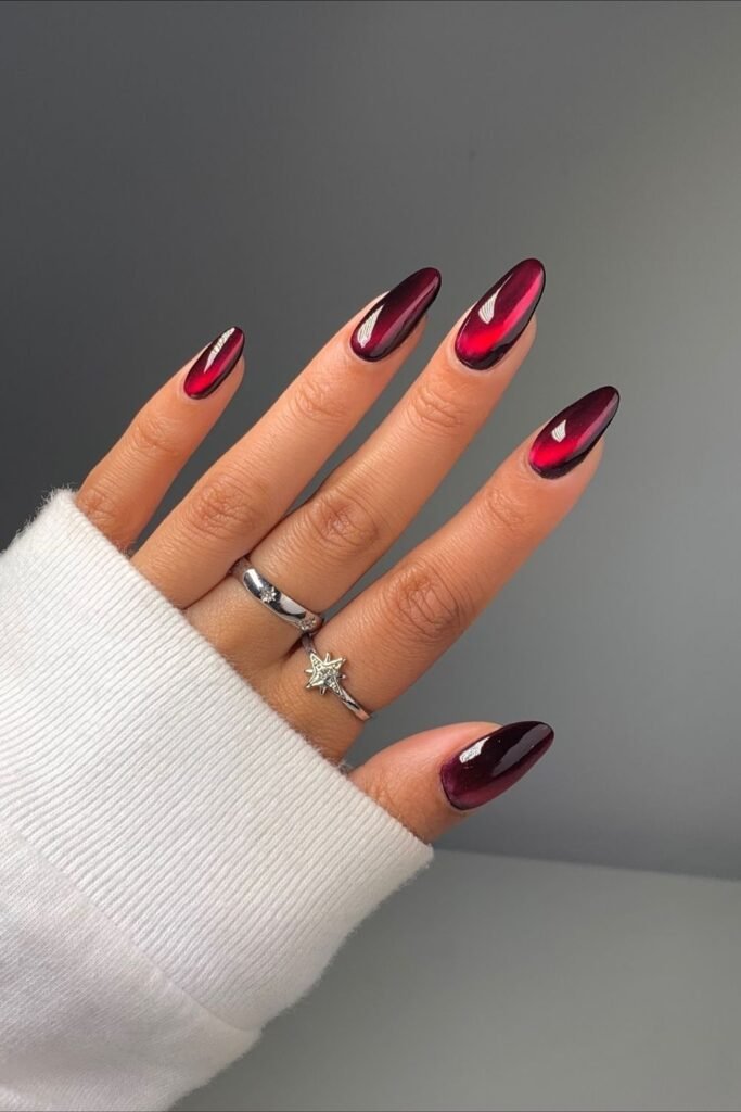 Dark Red Chrome Nails With a Vampire Glow