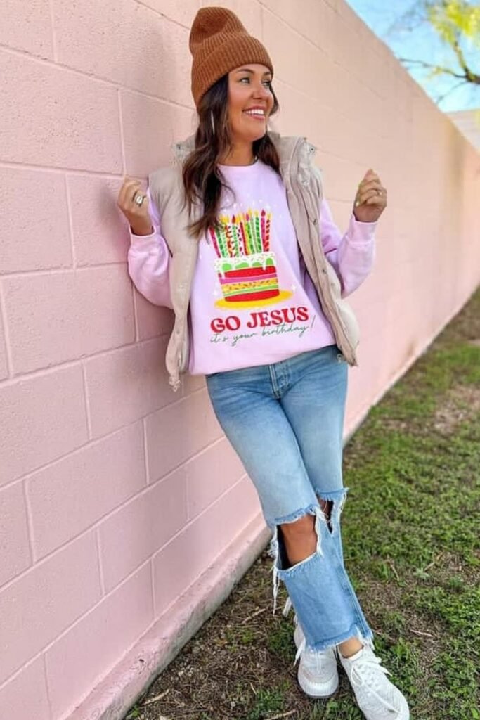 Festive Sweatshirt With a Puffer Vest and Ripped Jeans