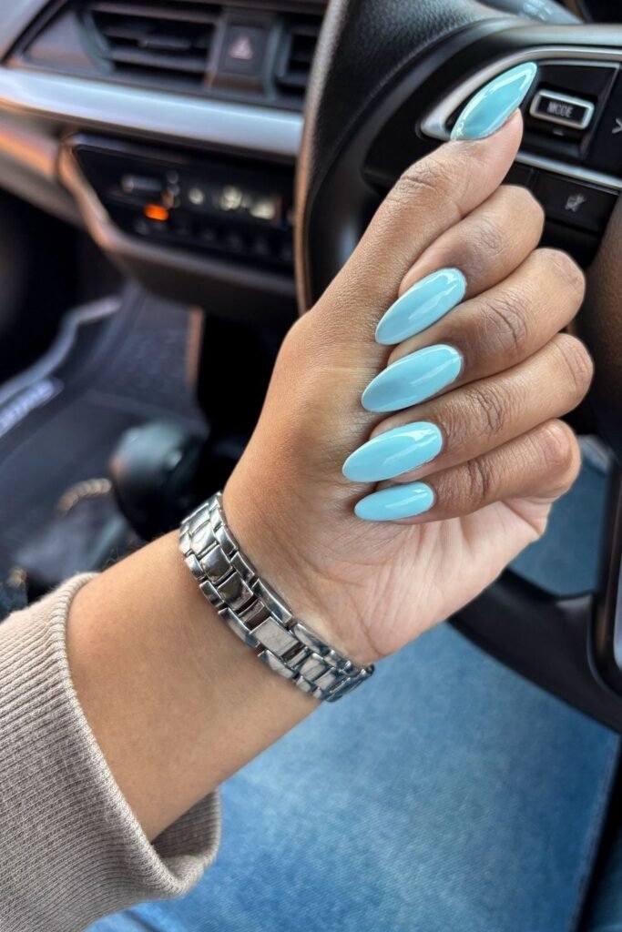 Glossy Baby Blue Almond Nails
