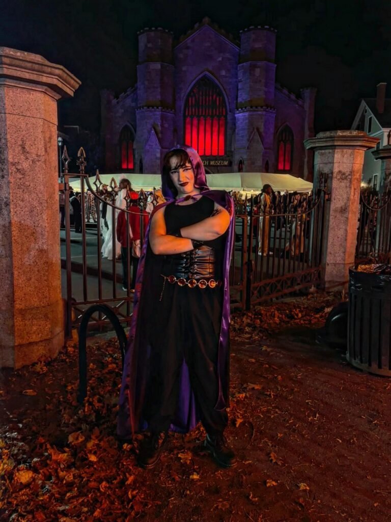 Hooded Purple Sorceress With a Corset Waist