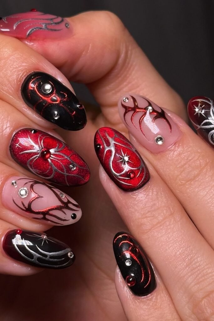 Metallic Red Spider Nails With Black and Silver Details