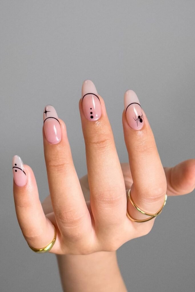 Minimal Pink Halloween Nails With Tiny Black Details