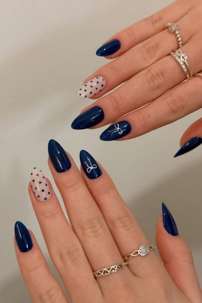 Navy Almonds With Bows and Sheer Dotted Nails