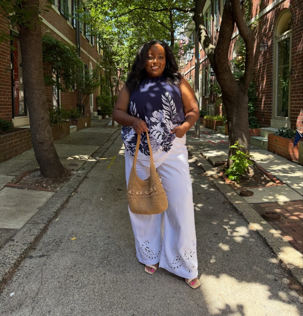 Navy Floral Top With White Wide Leg Trousers
