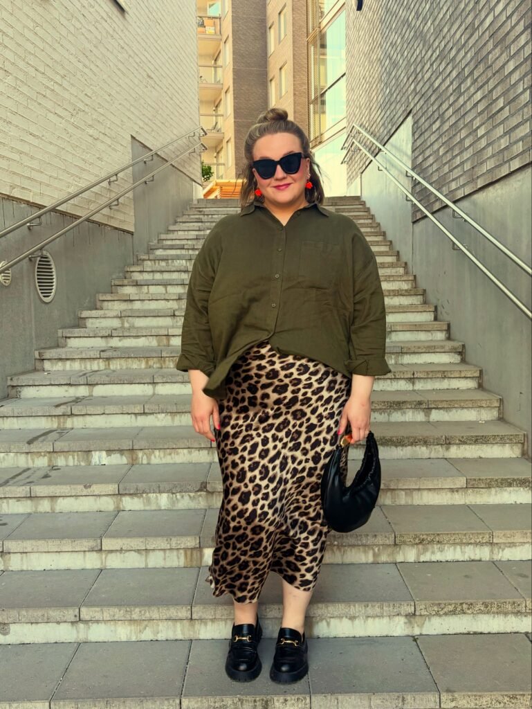 Olive Shirt With a Leopard Satin Midi Skirt
