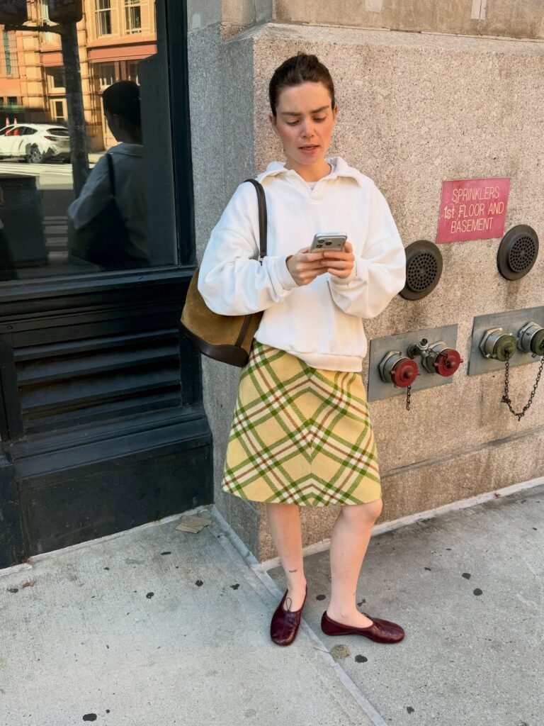 Oversized Sweatshirt With a Plaid Skirt