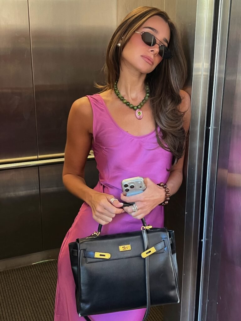 Pink Midi Dress With a Black Structured Bag
