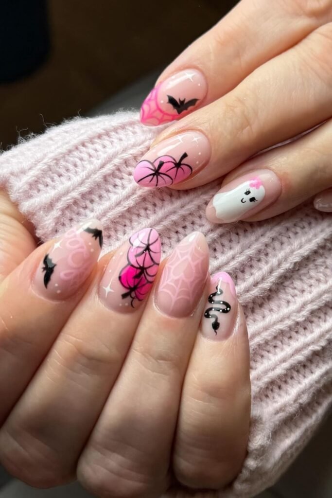 Pink Spiderweb Nails With a Sweet Ghost Twist