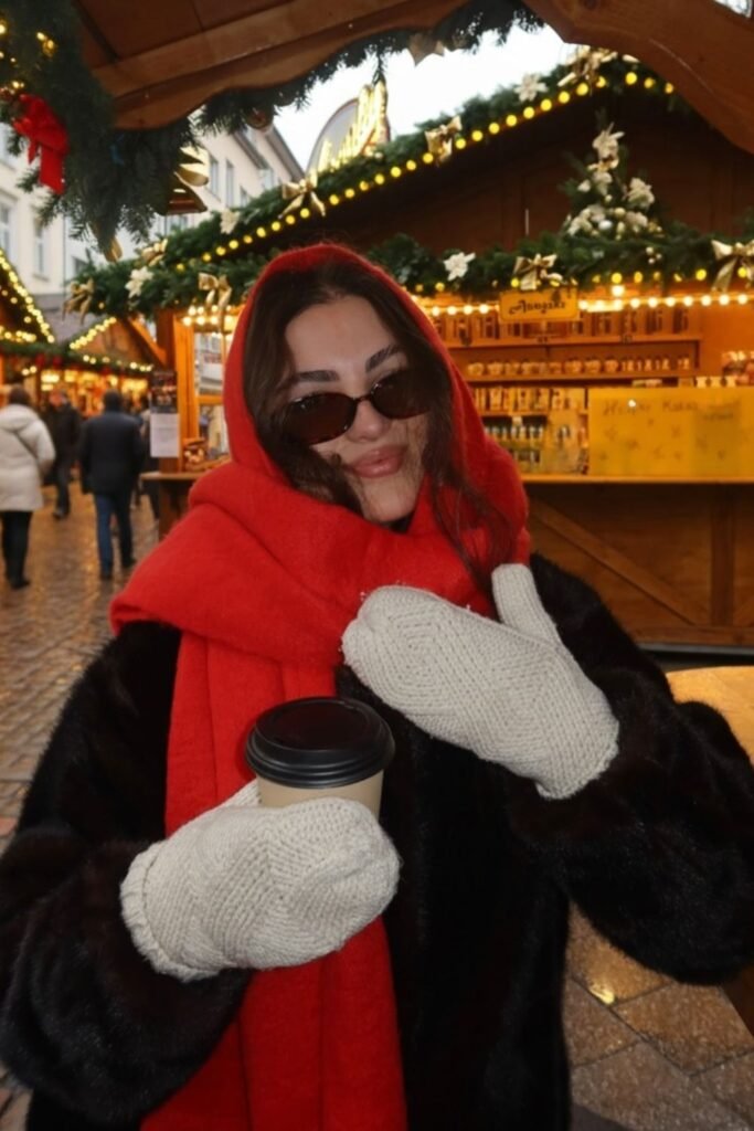 Plush Black Coat With an Oversized Red Scarf