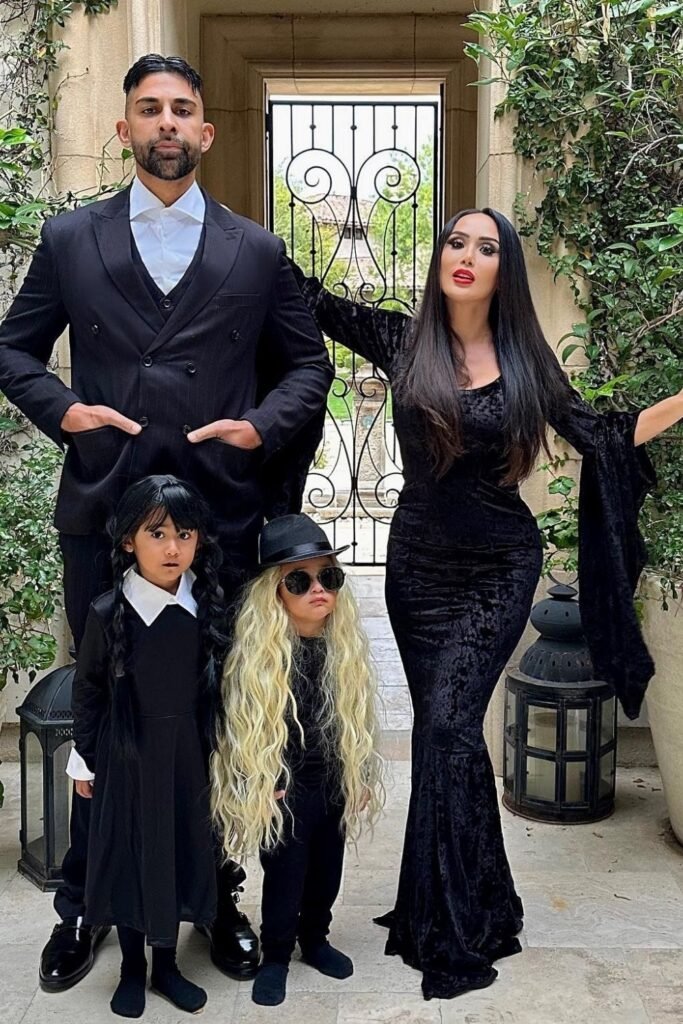 Polished Gothic Family in Head-to-Toe Black