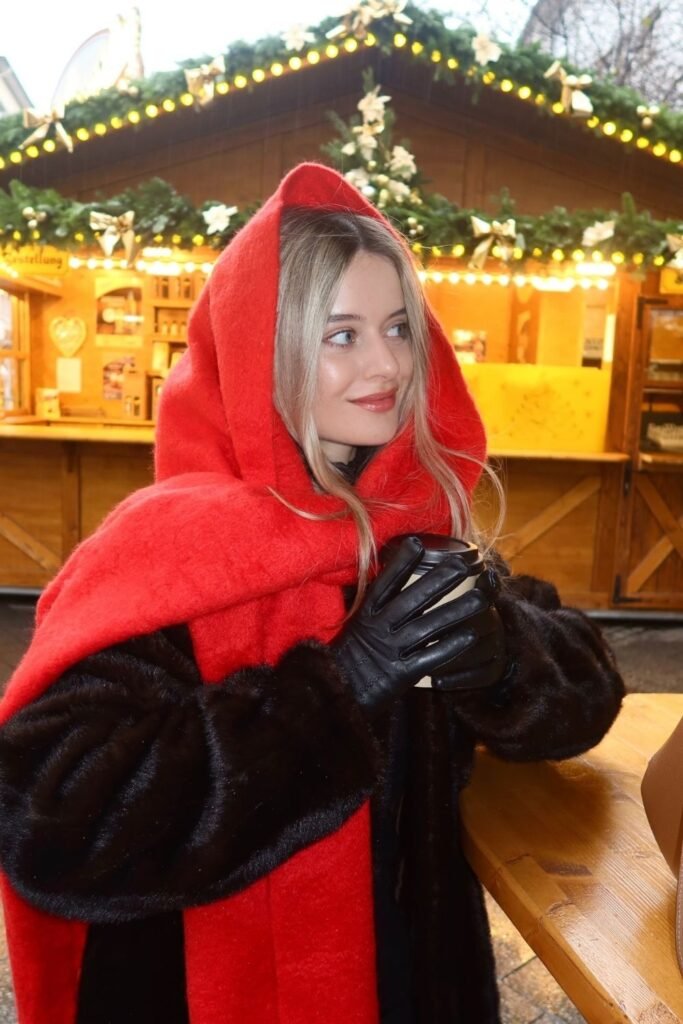 Red Hood Scarf With a Black Plush Coat
