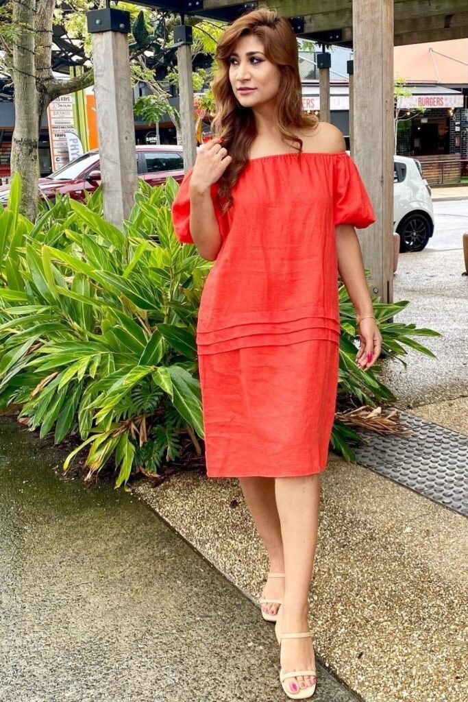Red Off Shoulder Dress for a Warm Weather Christmas Market