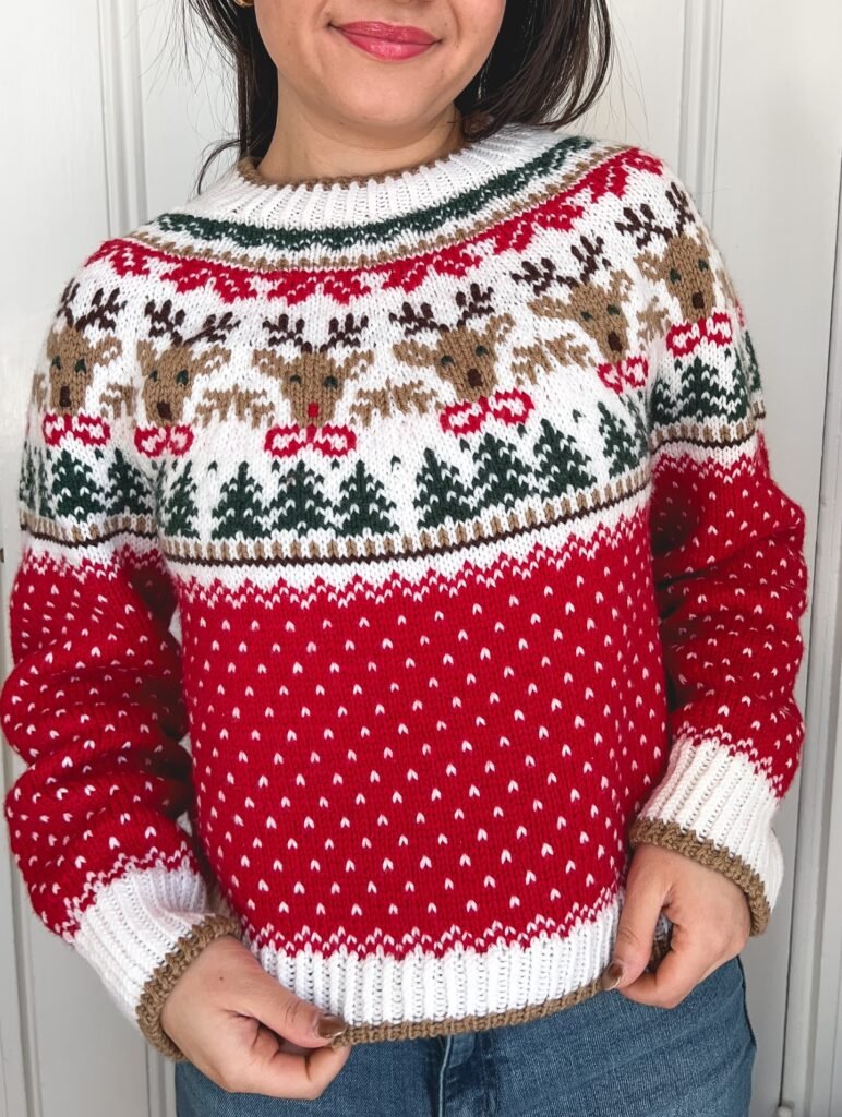 Red Reindeer Sweater With Light Wash Jeans