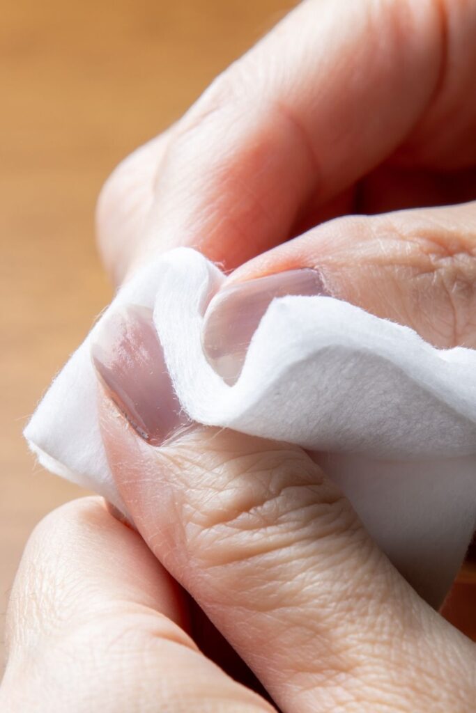 Remove polish from the damaged nail