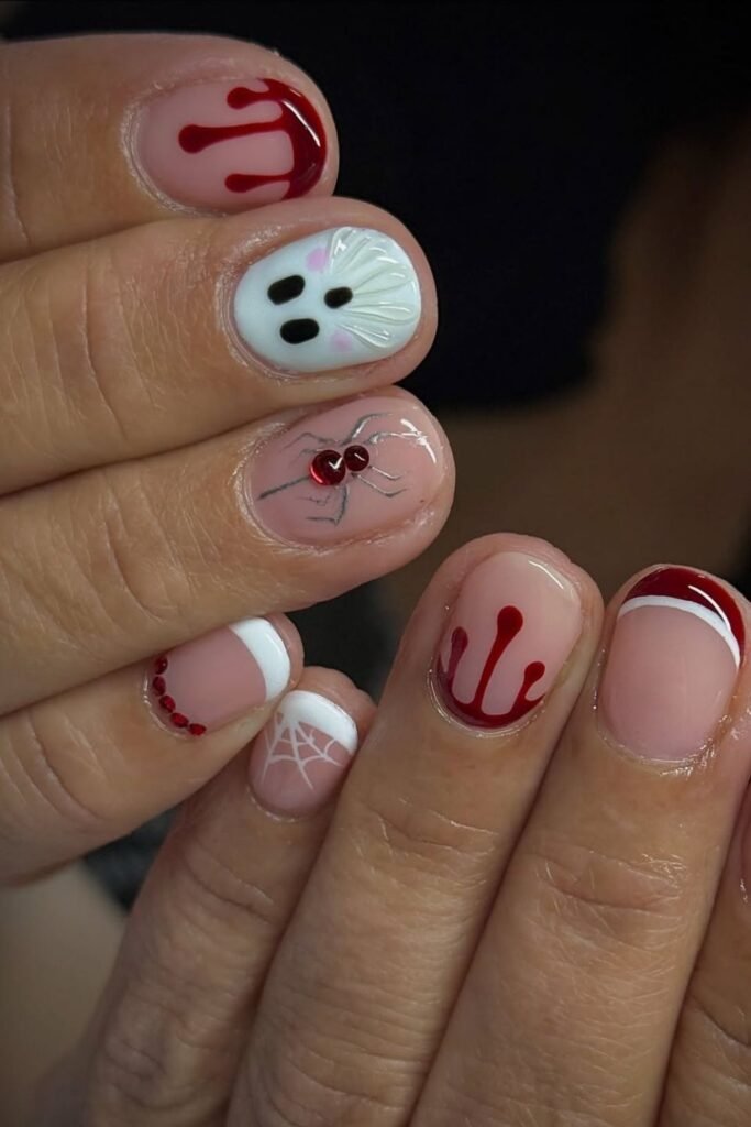 Short Red Drip Nails With Ghosts, Webs, and a Jeweled Spider