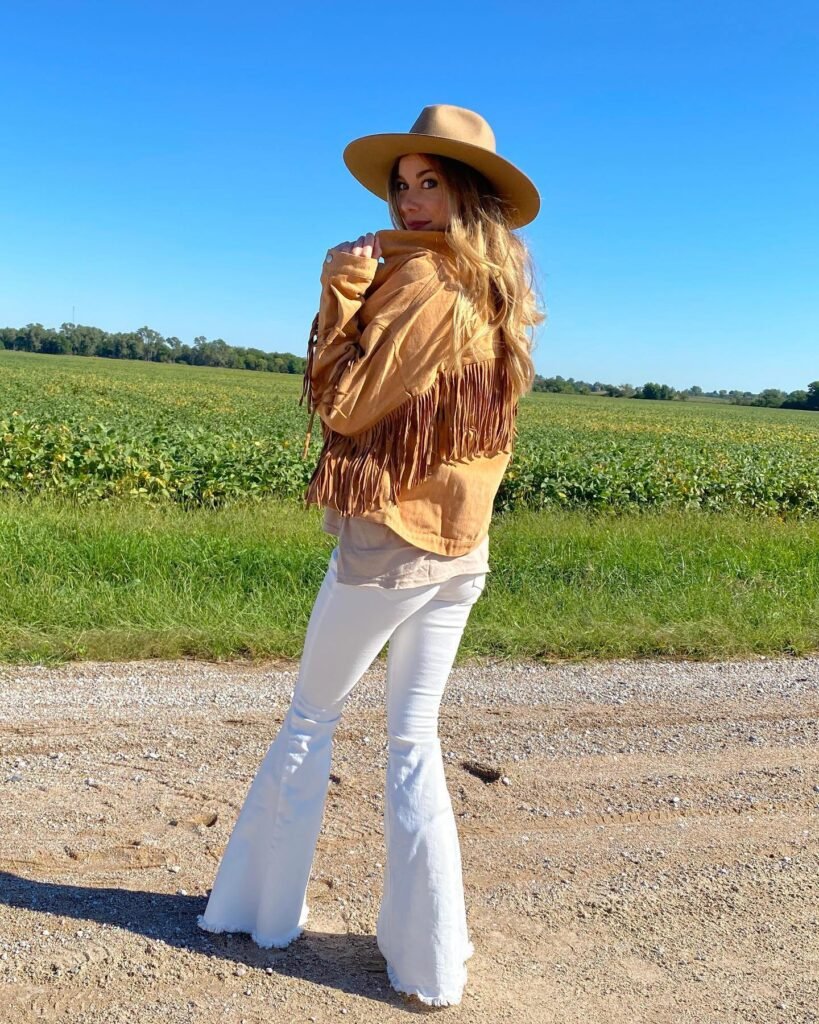 Tan Fringe Jacket With White Flared Jeans