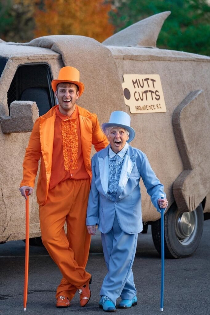 Two Ruffled Tuxedos in Orange and Powder Blue