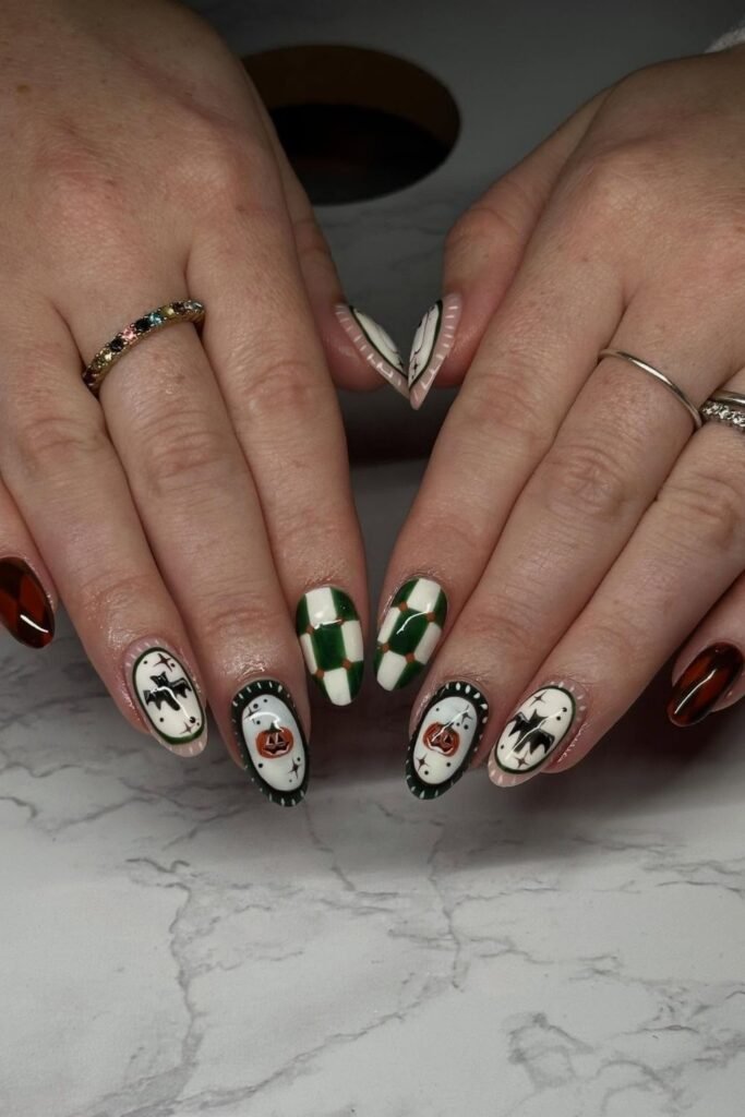 Vintage Halloween Portrait Nails With a Pink Swap