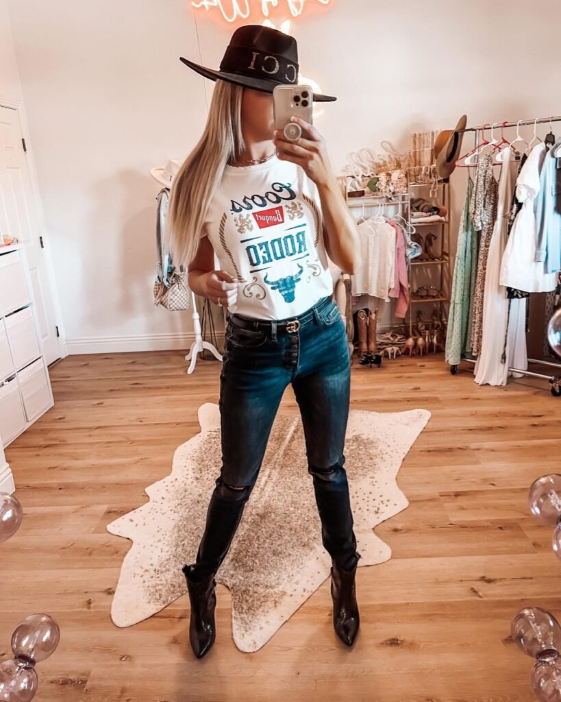 Western Graphic Tee With Dark Denim and a Black Hat