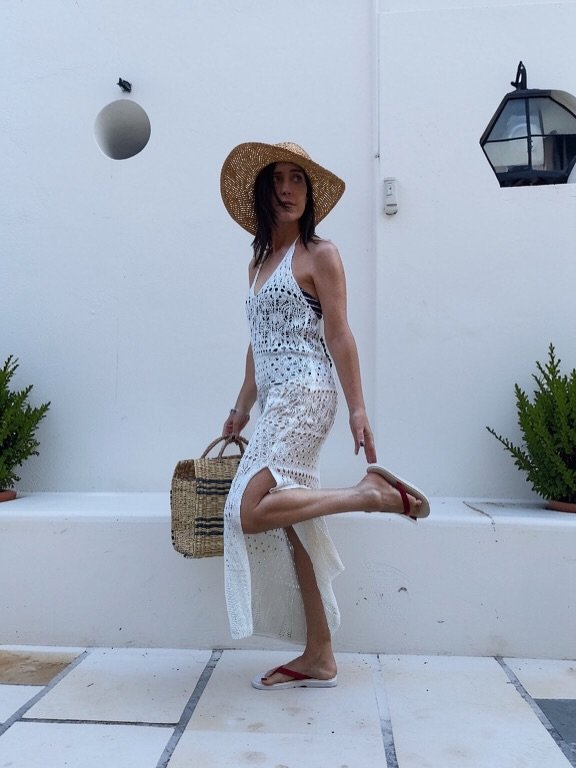 White Crochet Halter Dress With a Straw Hat