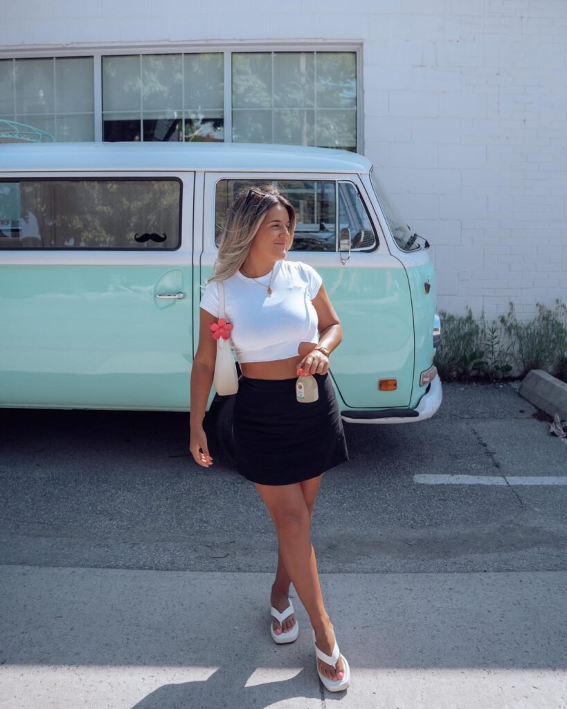 White Crop Tee With a Black Mini Skirt