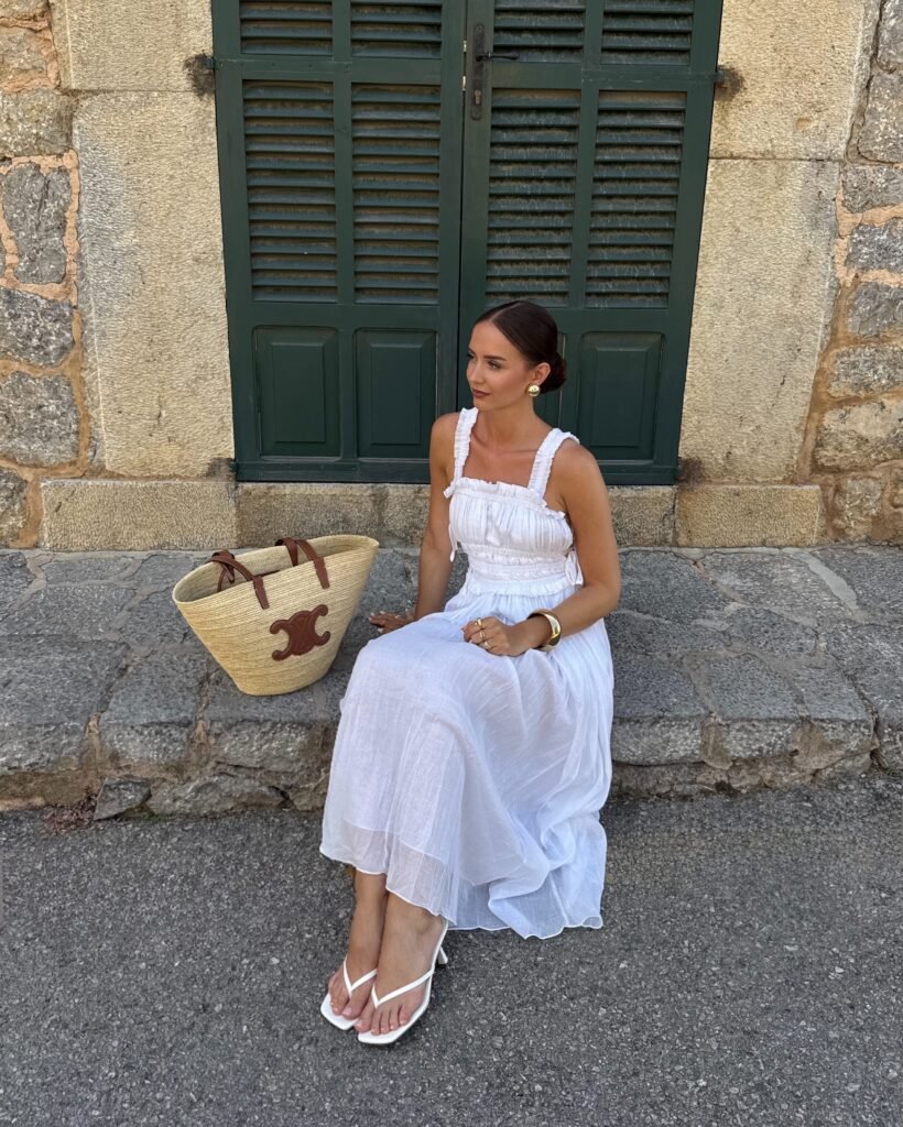 White Maxi Dress With a Straw Tote