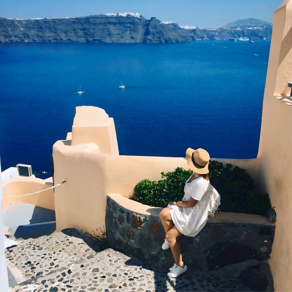 White T-Shirt Dress With Sneakers and a Straw Hat
