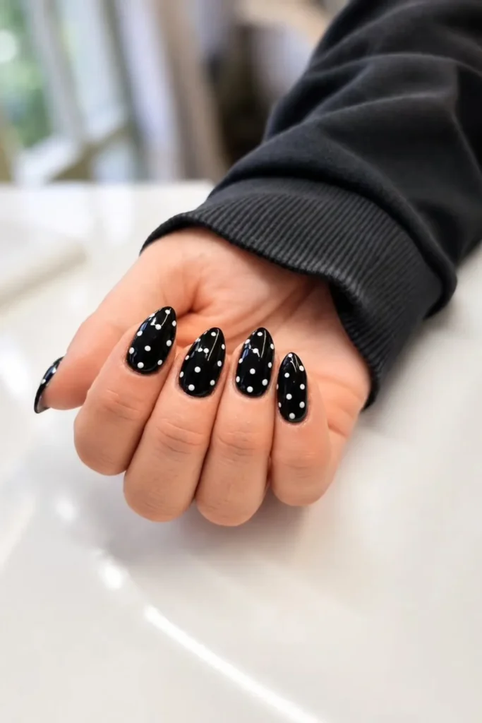 Glossy Black Nails With White Polka Dot Snow