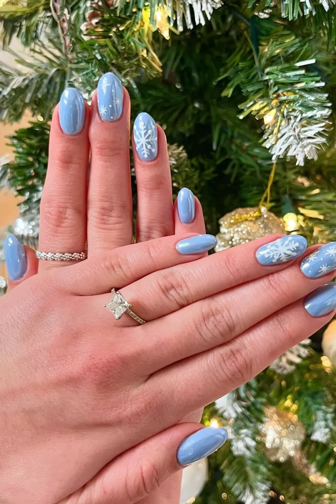 Light Blue Christmas Nails With Shimmer and Snowflakes