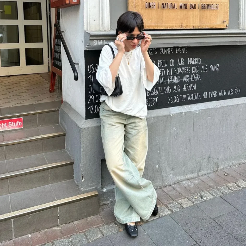Oversized White Tee, Faded Wide Leg Jeans, and Bow Flats