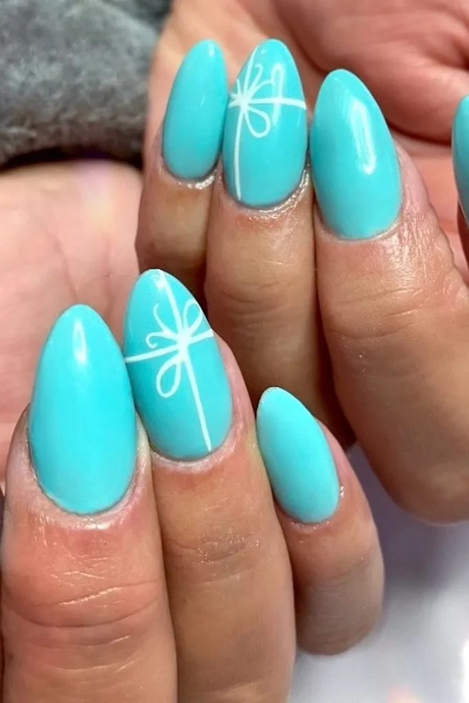 Robin’s Egg Blue Nails Tied With White Bows