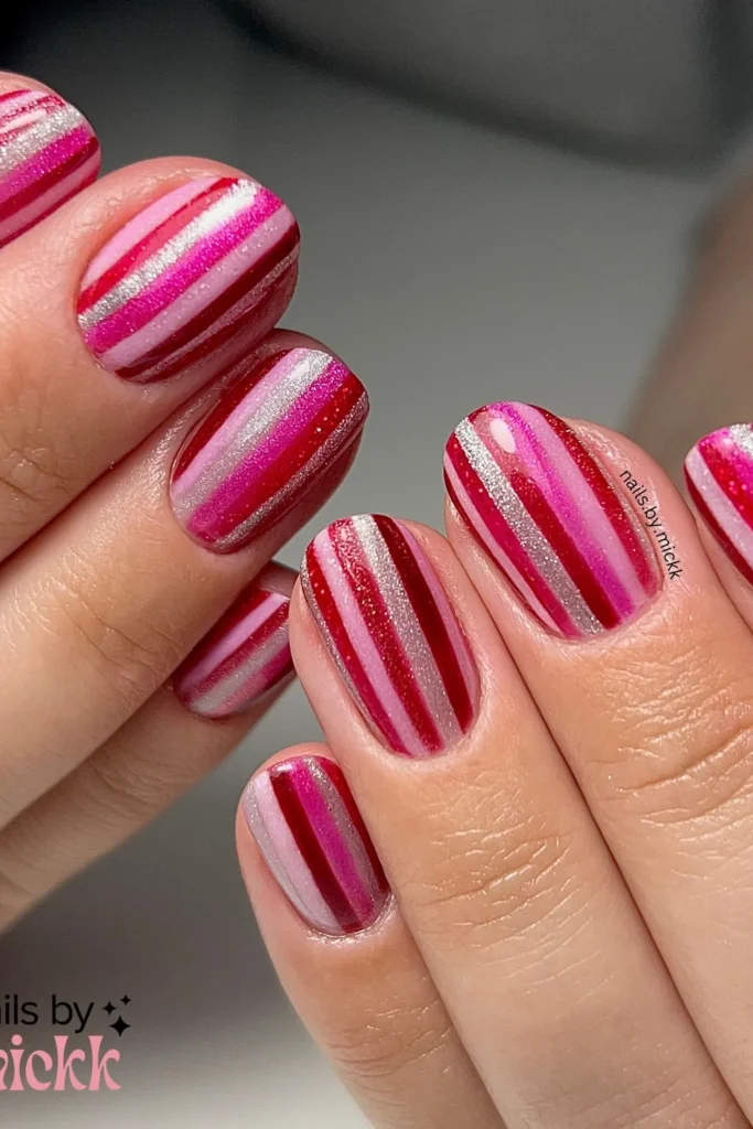 Pink and Red Christmas Nails in Candy Stripes