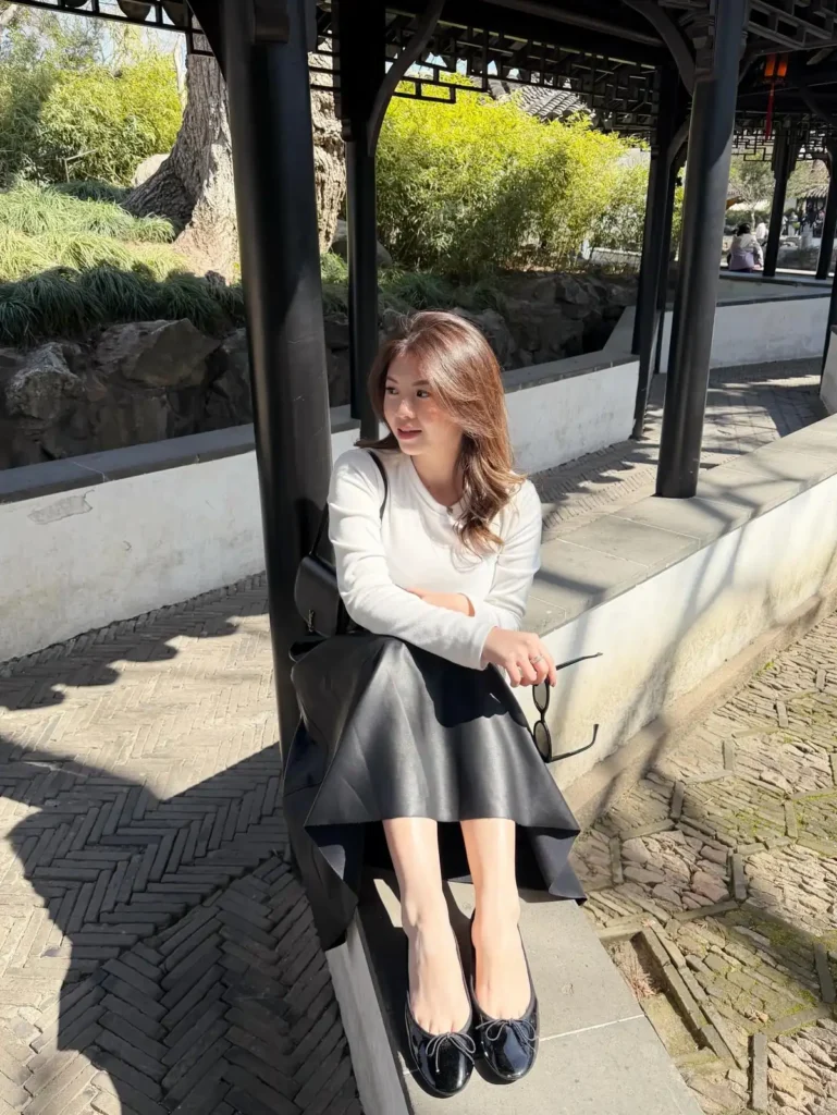 White Knit Top and a Black Leather Look Midi Skirt