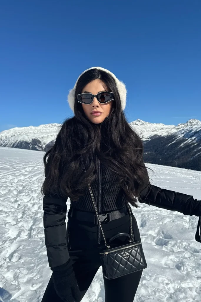 Black Quilted Ski Jacket With White Faux Fur Earmuffs