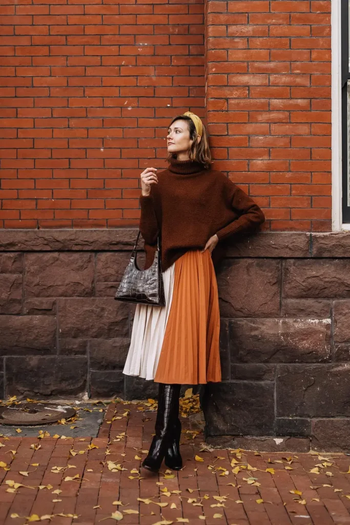 Chocolate Turtleneck and a Two Tone Pleated Midi Skirt