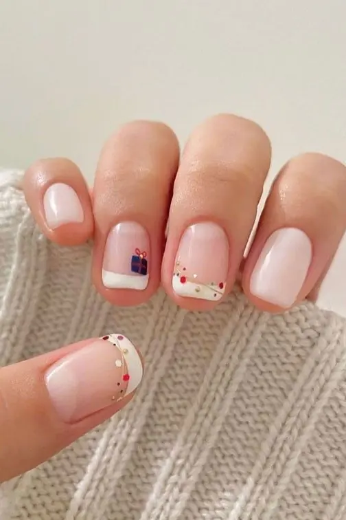 Simple Christmas Nails in Milky White With a Tiny Present