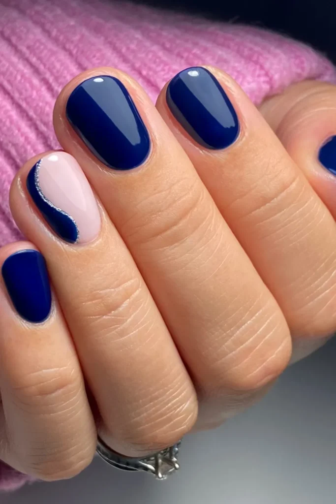 Short Blue Christmas Nails With a Silver Wave