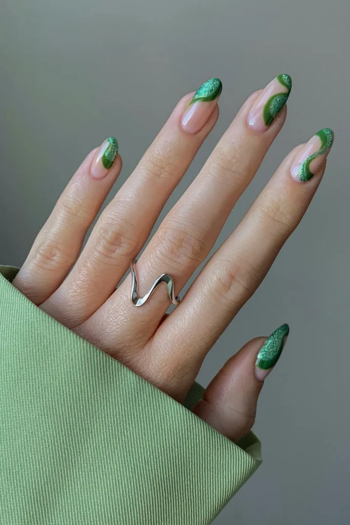 Glitter Green Swirl Nails for a Modern Holiday Look
