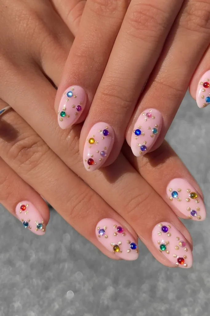 Jewel Toned Rhinestones on Baby Pink Nails