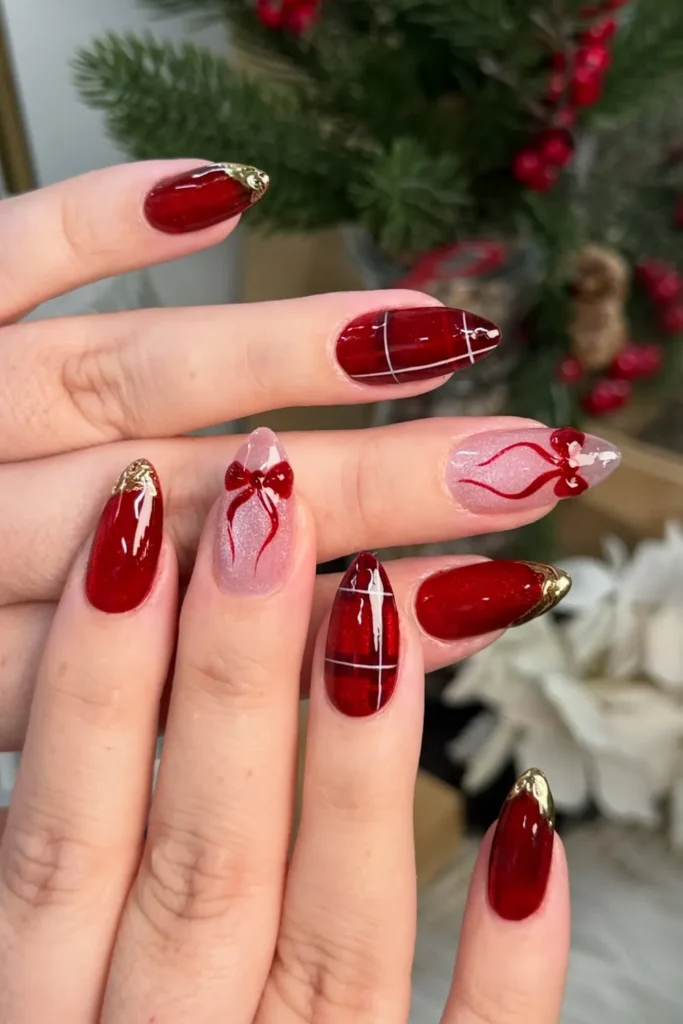 Red Jelly Nails With Gold Foil Tips and Bows