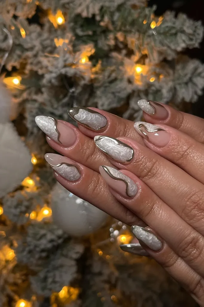 White and Silver Christmas Nails With Chrome Swirls